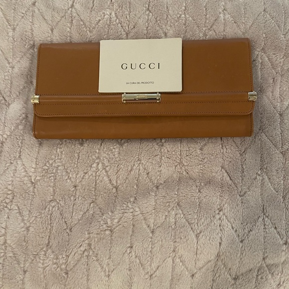 Gucci Handbags - Gucci Tan Leather Clutch